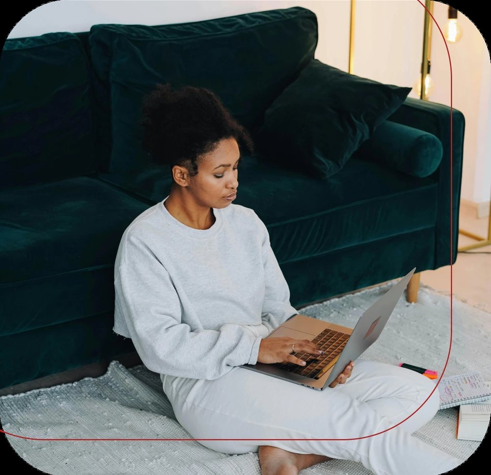 A student working through a Hackademia course on her laptop at home